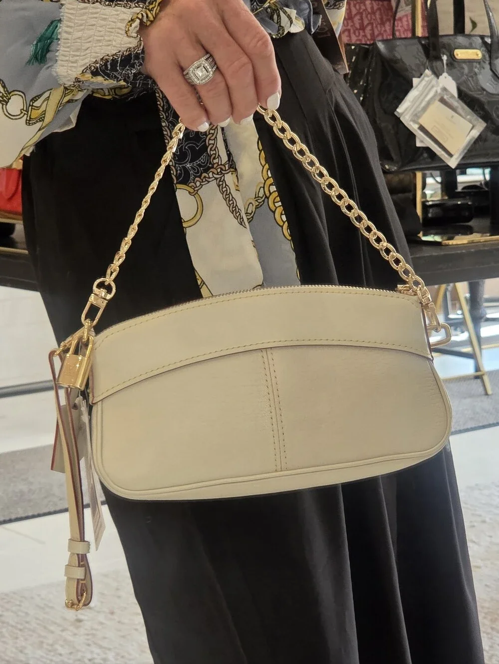 Louis Vuitton baguette/Wristlette Style leather, new condition